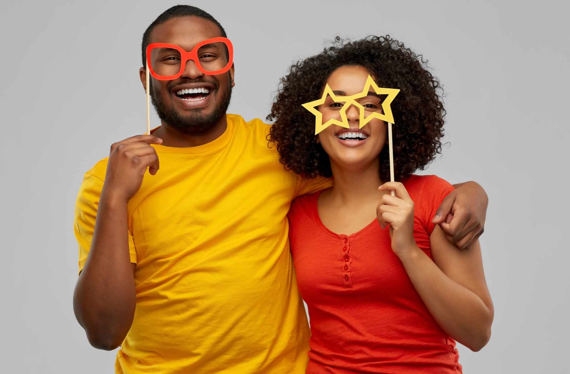 Couple posing in a photo booth
